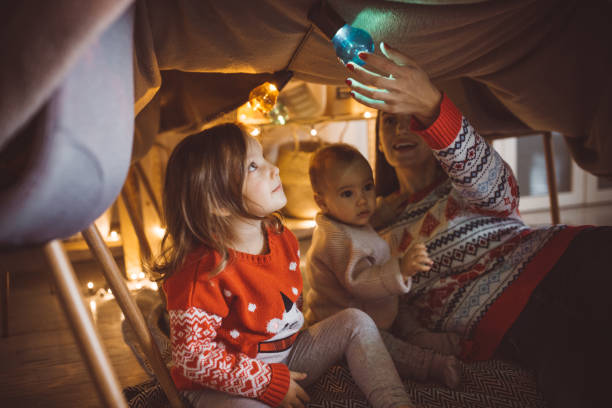 istock Love Christmas in blanket tent 1064767282
