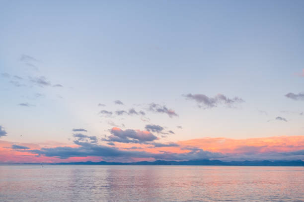 istock Beautiful cloudscape over the sea at sunset. 1064769784