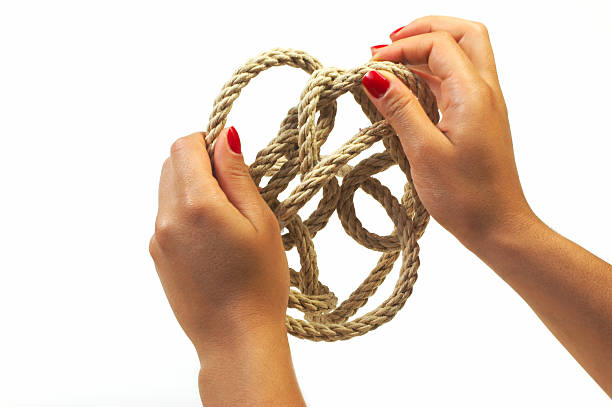 問題 - tied knot rope adversity emotional stress ストックフォトと画像