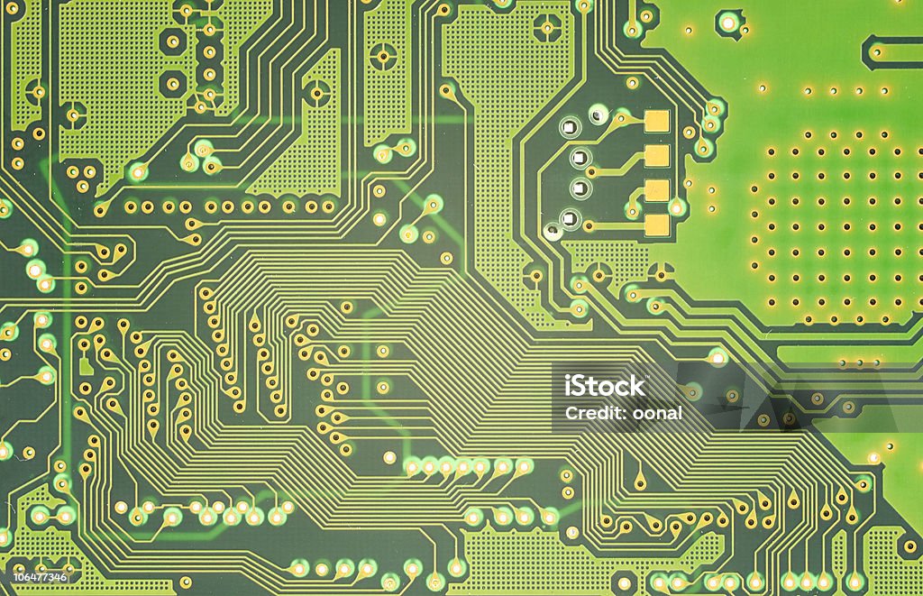 A close-up of a motherboards circuit paths Circuit paths Backgrounds Stock Photo