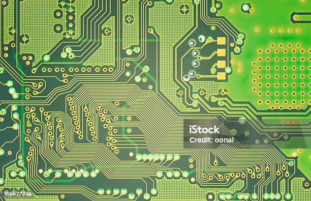 A Closeup Of A Motherboards Circuit Paths Stock Photo - Download Image Now - Backgrounds, Circuit Board, Close-up
