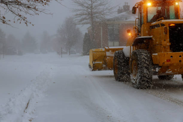 istock Snow removing machine cleans the street from the snow 1064785290