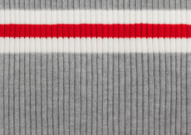 Gray, White and Red Striped Knit Wool Background