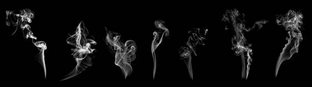 istock Set of abstract isolated moving smoke with black background. 1064789832