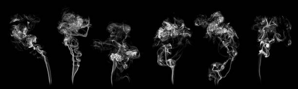 istock Set of abstract isolated moving smoke with black background. 1064789854