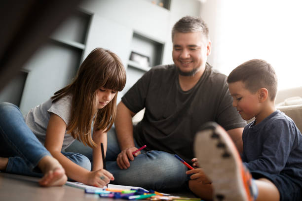 istock Father playing with his son and daughter 1064799526