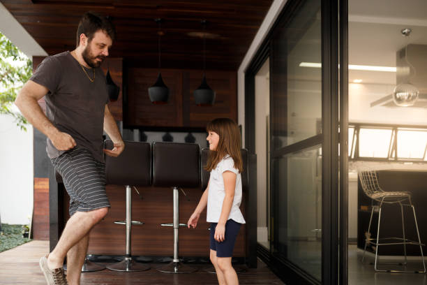 istock Dad playing ballet with his daughter 1064799584