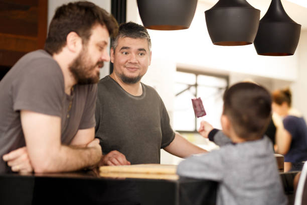 istock Two fathers with son and daughter 1064799642