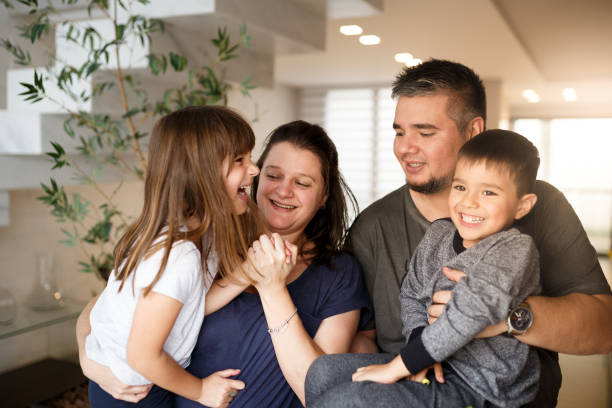 istock Happy family at home 1064799718