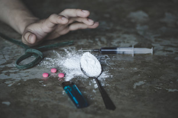 human hands on dark background, stop drug addiction concept, do not interfere with drugs,  international day against drug abuse. - narcotic teenager cocaine drug abuse imagens e fotografias de stock