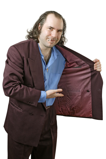 Photo of a sleazy drug dealer showing you what he has in his jacket.  Add your own drugs, merchandise, or whatever your vice my be.