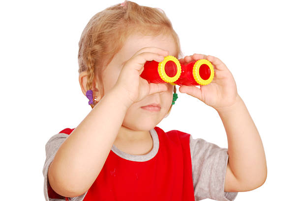 istock little girl with binoculars 106480944