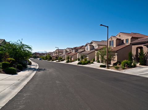 Modern street of typical middle class desert homes near Las Vegas Nevada.