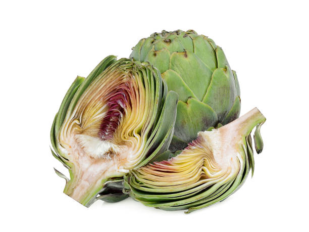 istock whole and half artichoke with slice isolated on white background 1064814186