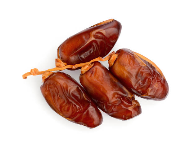 istock dried date fruits isolated on white background, top view, flat lay 1064815764