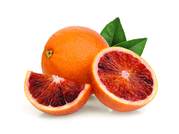 istock whole and half with slice blood orange with green leaf isolated on white background 1064816100