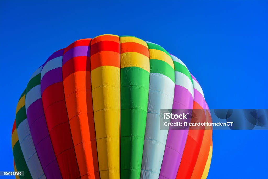 Rainbow balloon Plainville, CT, Hot Air Balloon Festival; blue sky; clear day; colors Connecticut Stock Photo