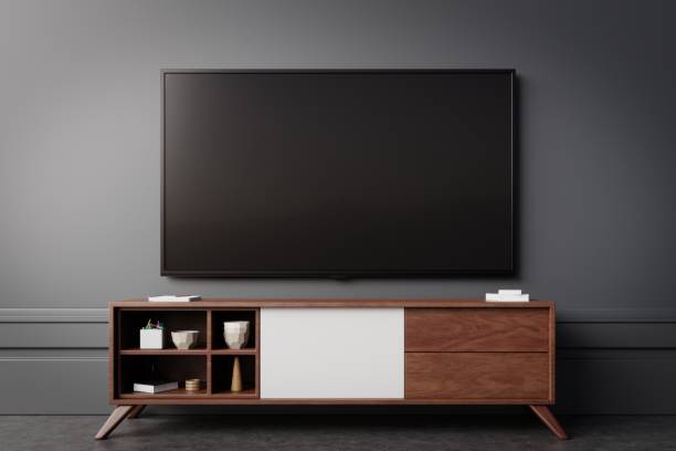 istock TV on the cabinet in modern room 1064826670