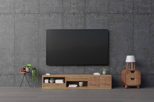 istock TV on cabinet with lamp,plants,book 1064826672