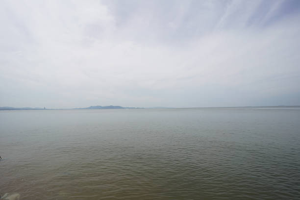 landscape with sea and sky in cloudy day