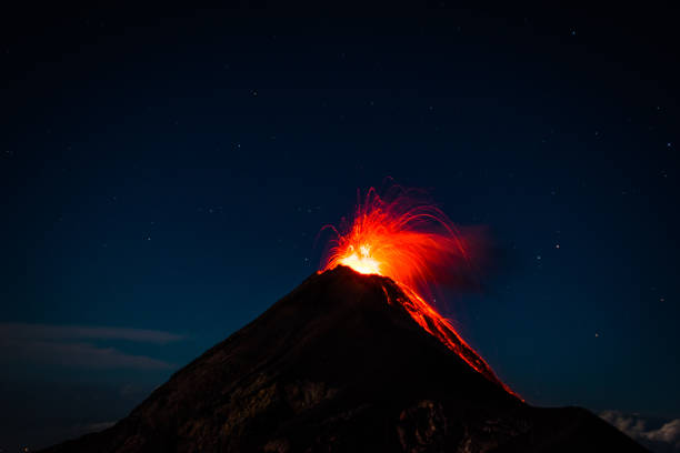istock Volcano Fuego Erupting on a clear night 1064828378