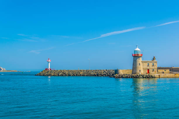 istock Lighthouse in the harbour of Howth, Ireland 1064829594