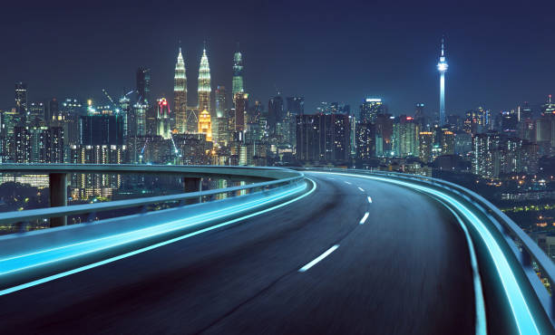 Highway overpass motion blur with city background