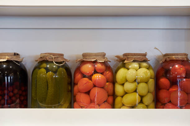 preserved jars of vegetables on shelf