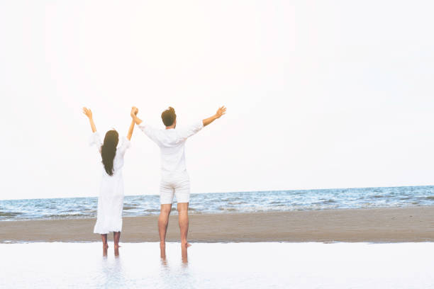 istock Couple going honeymoon on tropical beach in summer 1064836954