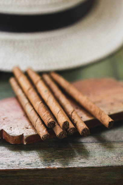 istock Cigars on vintage wooden table 1064837064