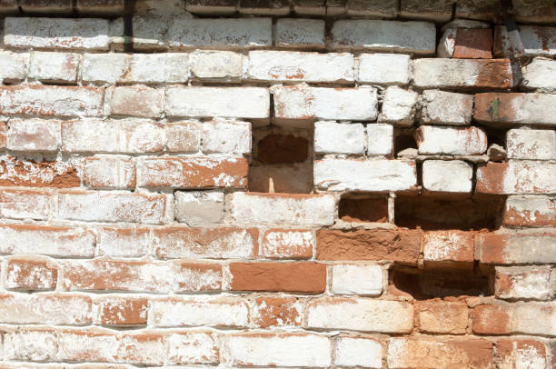 istock Fragment of Venetian old brick wall as background 1064841228
