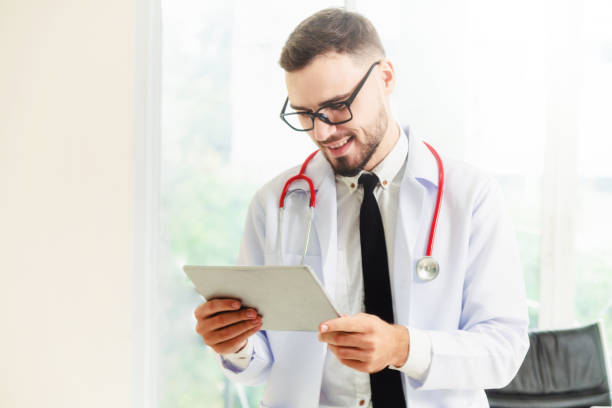 istock Doctor working on tablet computer in the hospital.Doctor working on tablet computer in the hospital. 1064852842
