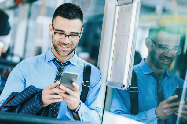 istock Businessman commuting with public transport 1064868614