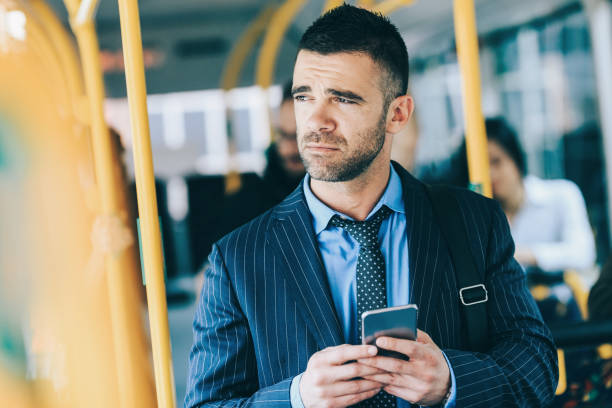 istock Businessman commuting with public transport 1064869050
