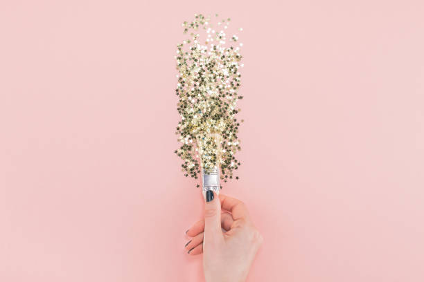 istock Surreal Paint brush drawing golden stars confetti 1064872654