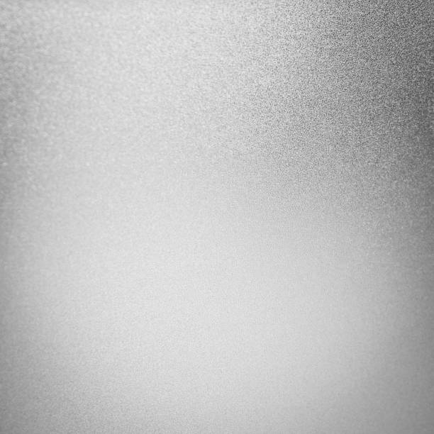 istock Shiny metal silver foil texture for background glitter sparkle abstract light bright texture. 1064875028