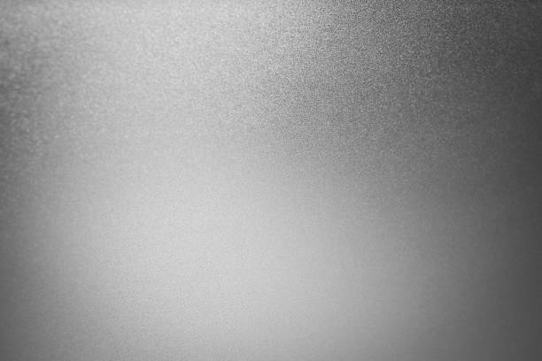 istock Shiny metal silver foil texture for background glitter sparkle abstract light bright texture. 1064875134