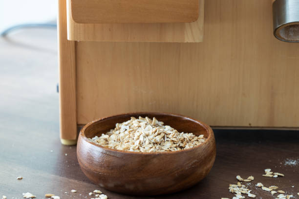 fresh oats on wooden table