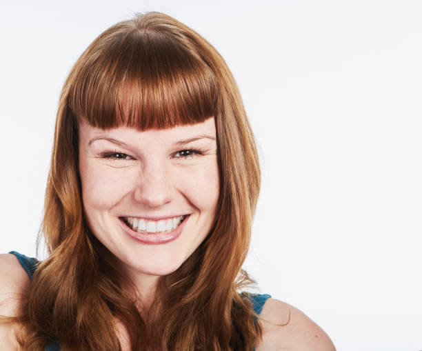 istock Redheaded beauty smiling happily 1064884958