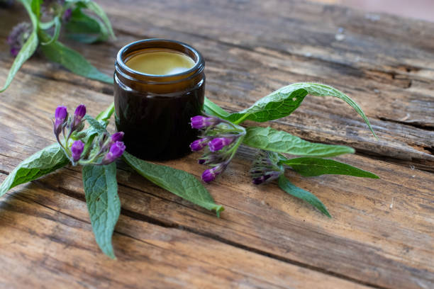 Ointment with comfrey Ointment with comfrey ointment photos stock pictures, royalty-free photos & images