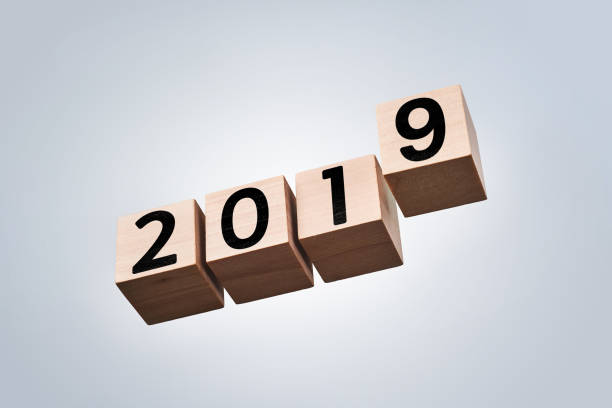 istock wooden cube with word 2019 and 2018 1064890214