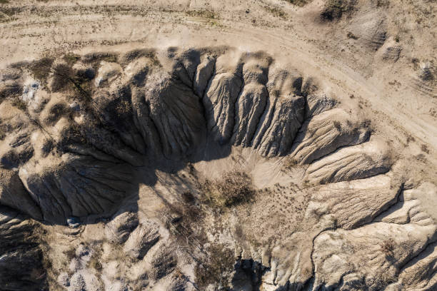 istock Surrealistic aerial image of abandoned opencast mine 1064892728