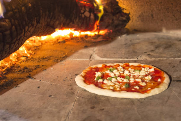 istock Pizza margherita in the stone oven 1064895286