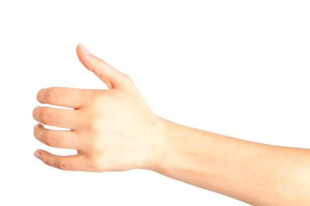 istock Woman hand holding something like a bottle or glass 1064901852