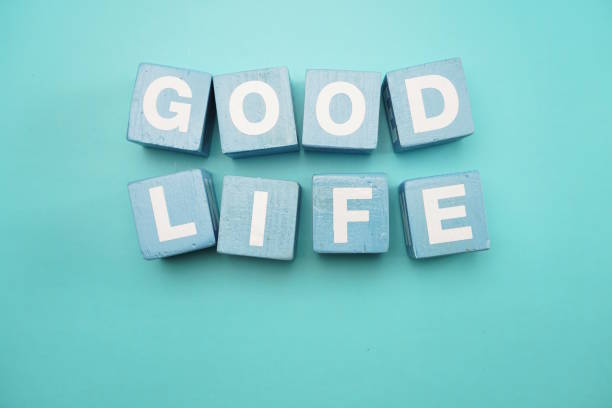 istock Good Life created with cubes alphabet letters on blue background 1064901874