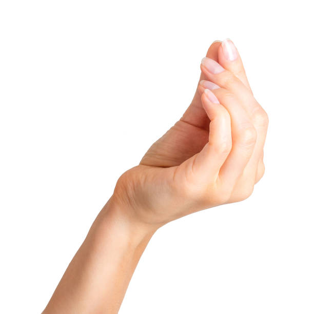 istock Woman hand holding something with two fingers 1064903156