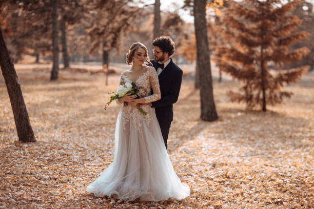 istock Bride and groom embracing 1064904004