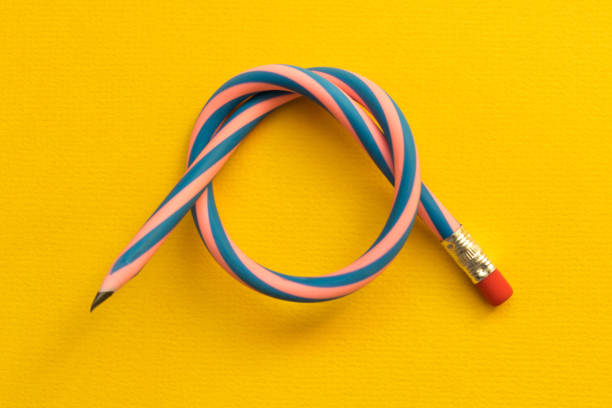 istock Flexible pencil . Isolated on yellow background 1064904418