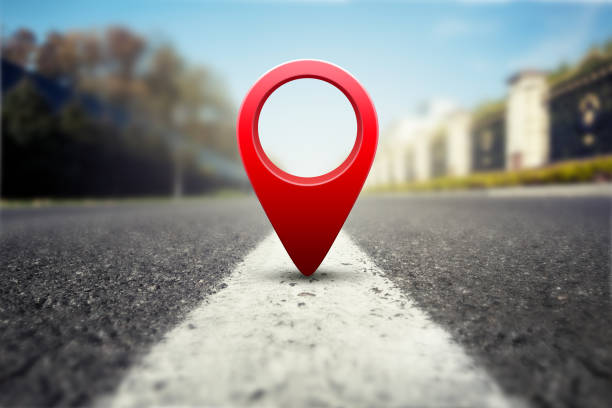 pin Red GPS pin on asphalt highway background global positioning system photos stock pictures, royalty-free photos & images