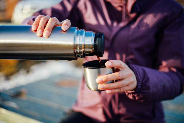 istock Woman drinks hot tea or coffee 1064911780